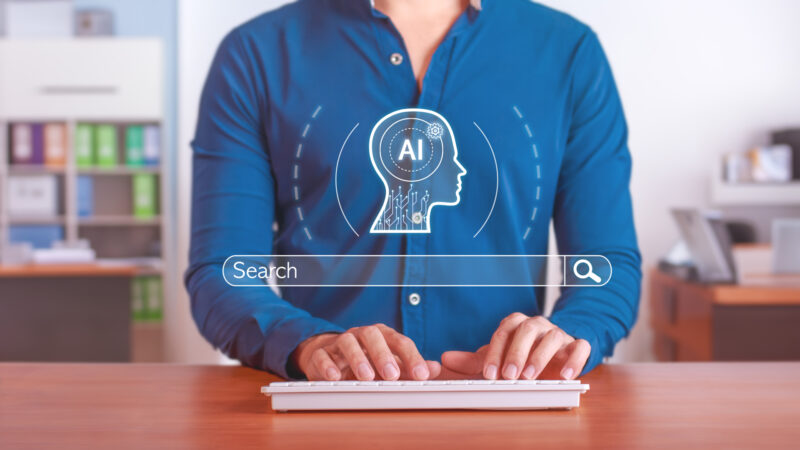 Man searching Google using AI
