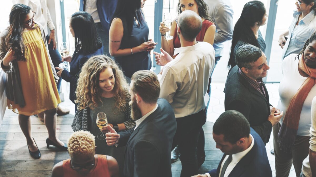 Business networking event representing Geo Marketing, local SEO, and contextual AI search visibility