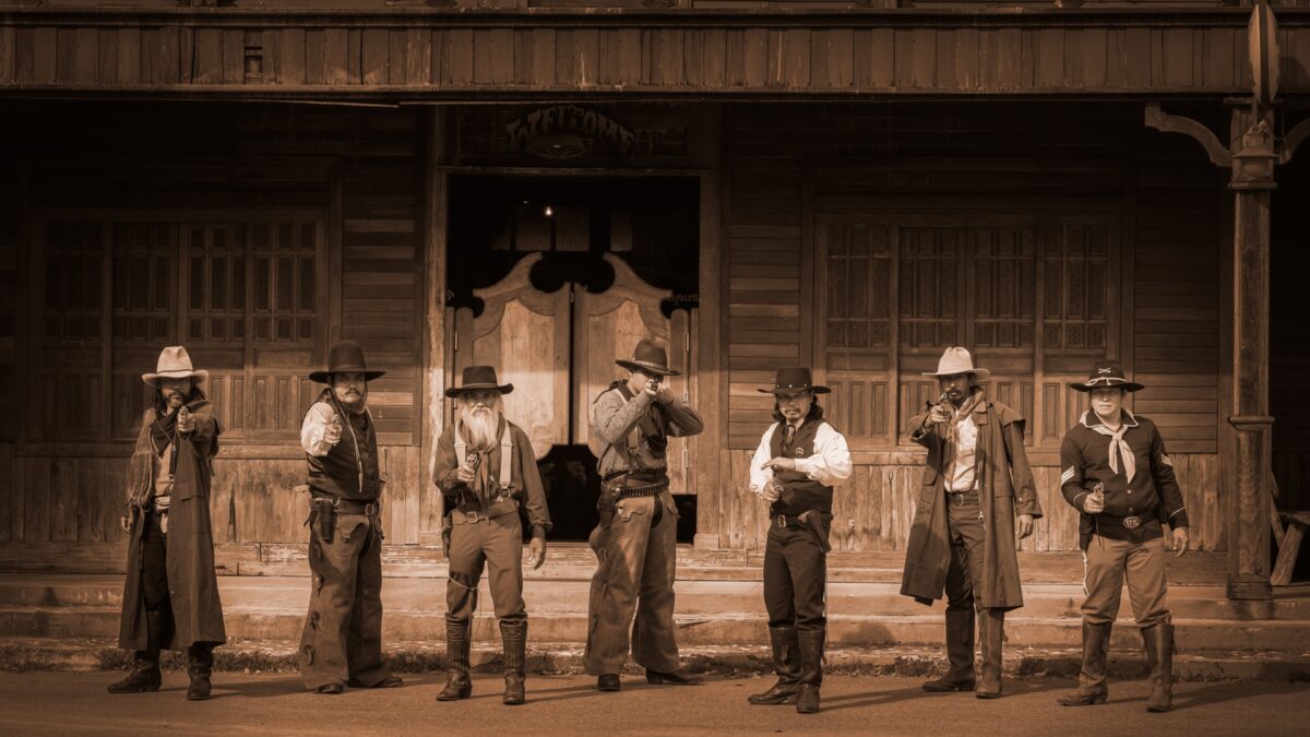 Wild west gunslingers representing the early competitive days of SEO and changing AI search trends
